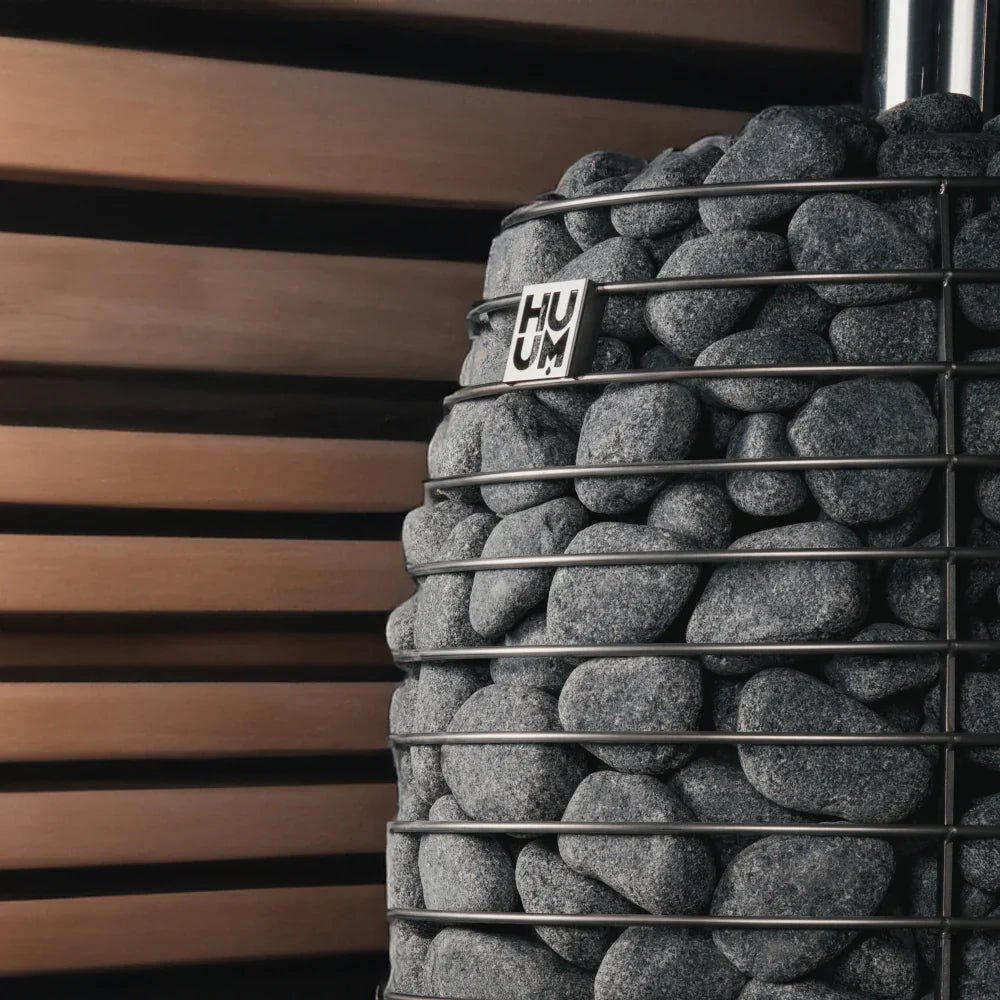 HUUM HIVE Flow Wood Burning Sauna Stove HUUM HIVE_FLOW_environment_close_lighter_bbba044e-7fa2-4fd3-ba8b-85e90f1f2622.webp