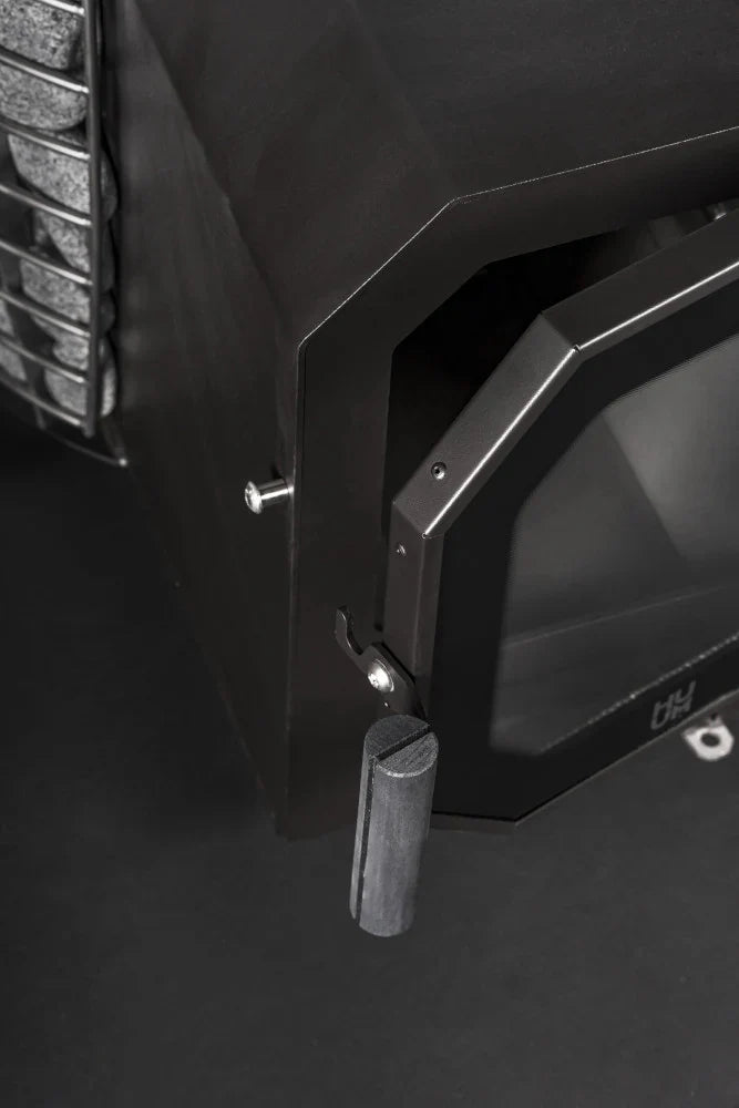 HUUM HIVE Flow Wood Burning Sauna Stove HUUM HIVE_FLOW_handle_lighter_507b67a2-343e-4335-8e7a-f513dab677c9.webp
