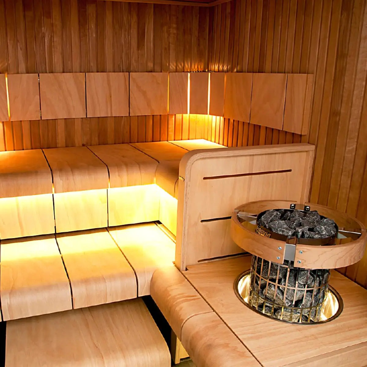 Wooden sauna interior with bench and heater by Finnish Sauna Builders