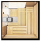 Wooden sauna with benches and a heater in a modern interior setting.