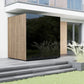 Modern house exterior with a large reflective surface and wooden paneling.